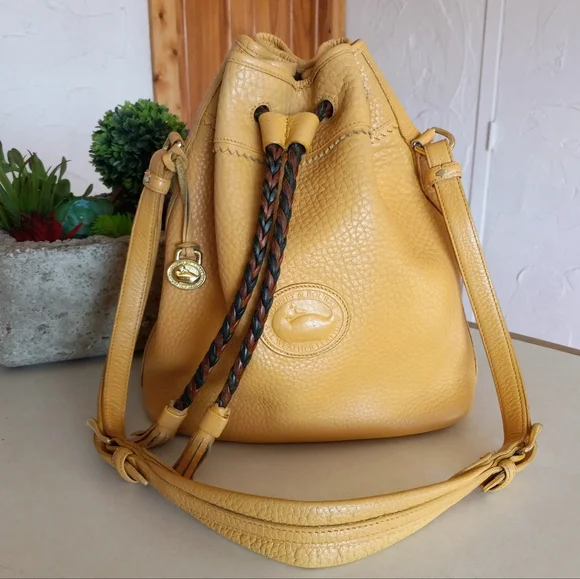 Dooney & Bourke Vintage, Teton Drawstring Bag in solid Palomino Yellow - Picture 3 of 12